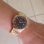 Imagem de Relogio Orient feminino dourado mostrador preto banhado folheado cravejado com strass com numeros e calendário a prova dagua aço inox FGSS1237 P2KX