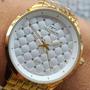 Imagem de Relogio Technos feminino grande dourado banhado aço inox  lado pedrinhas coloridas strass 2035NAF/1B