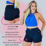 Imagem de Short Jeans Feminino Com Detalhe de Botões nas Laterais Azul Escuro Cintura Alta