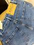 Imagem de Short jeans lança perfume mom com bordado 501SH002275