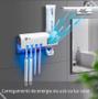 Imagem de Transforme sua rotina de cuidados com o Dispenser Automático Porta Escova de Dentes Pasta e Esterilizador UV.