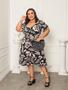 Imagem de Vestido midi  cristina em tecido Duna estampado com elástico na cintura plus size